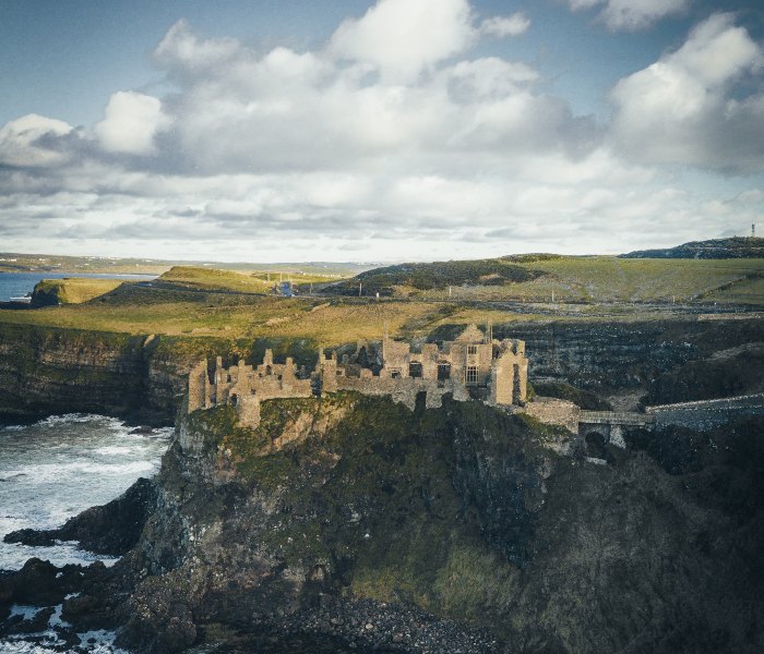 an abandoned castle on a cliff in Ireland 