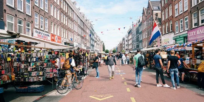 Vendor stalls line a typical Amsterdam street