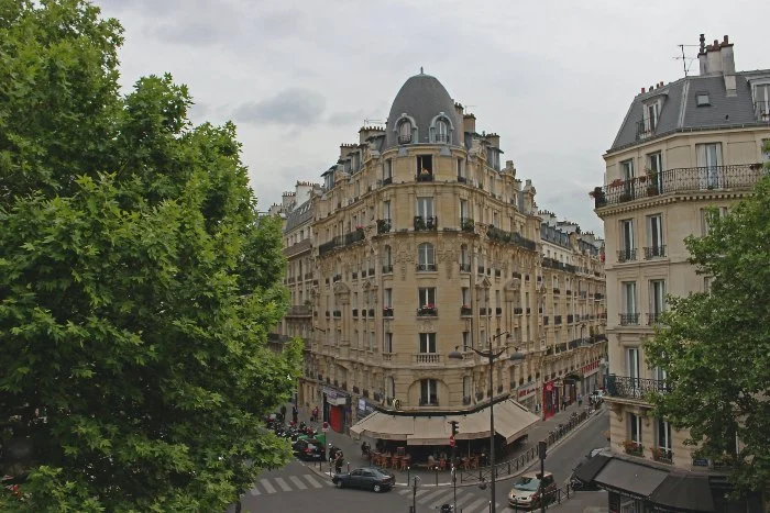 A typical Parisian style building and trees