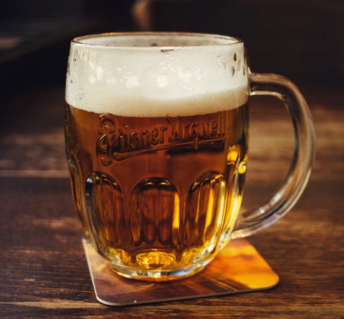 A pilsner beer in a traditional Czech glass 