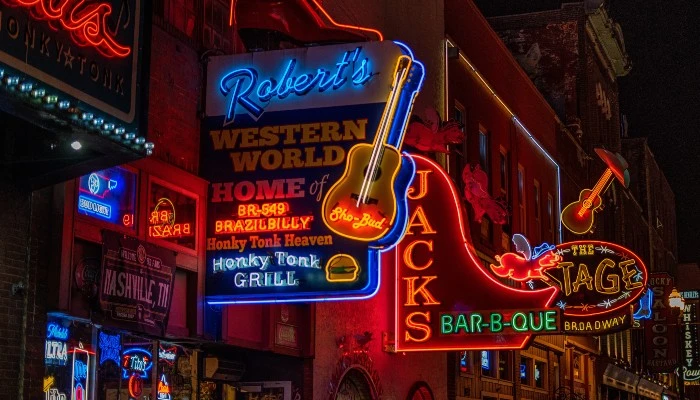 neon lights outside of honkey tonk bars in Nashville