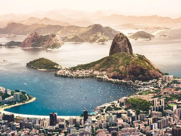 Mountains and a beach lined bay of Rio de Janeiro
