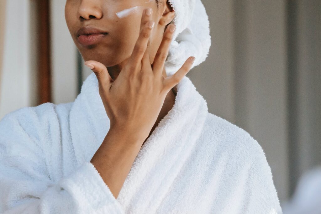 A student enjoying a self-care routine with a spa facial treatment, reflecting the rejuvenating experiences available on student wellness trips.