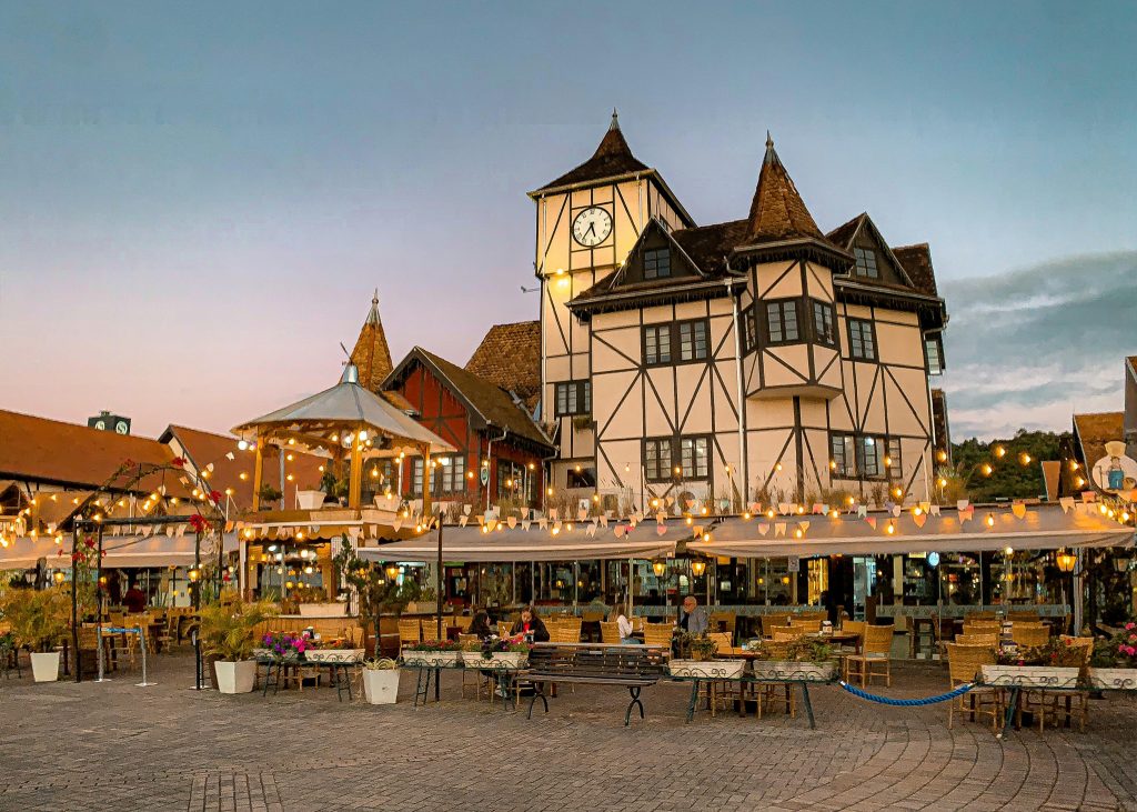 German-style half-timbered square at Blumenau’s Vila Germânica lit at dusk, Brazil.
